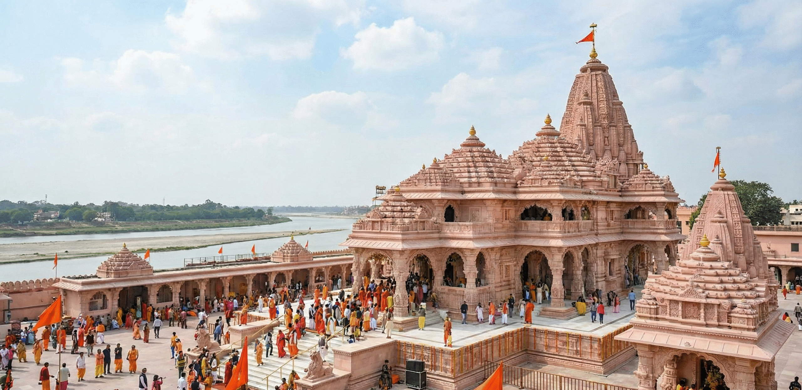 Ayodhya Ram Mandir with devotees and river view during daytime